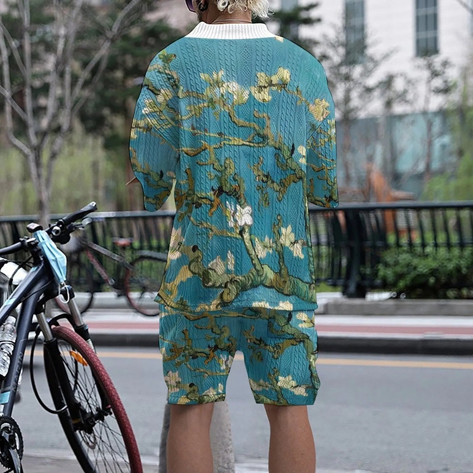 Men's peacock blue knitted casual suit set with 3D print design, showing T-shirt and mid-length shorts.