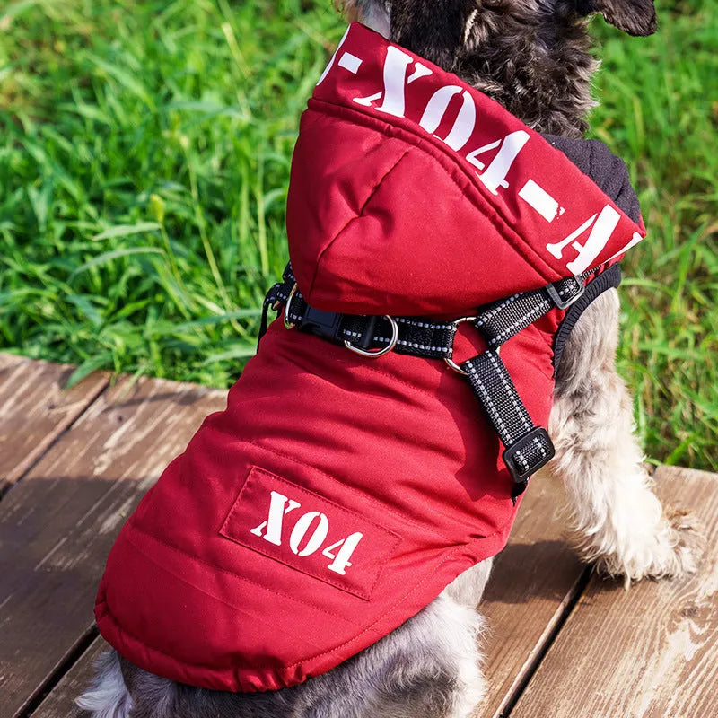 Red fleece-lined waterproof dog coat with hood on a small dog