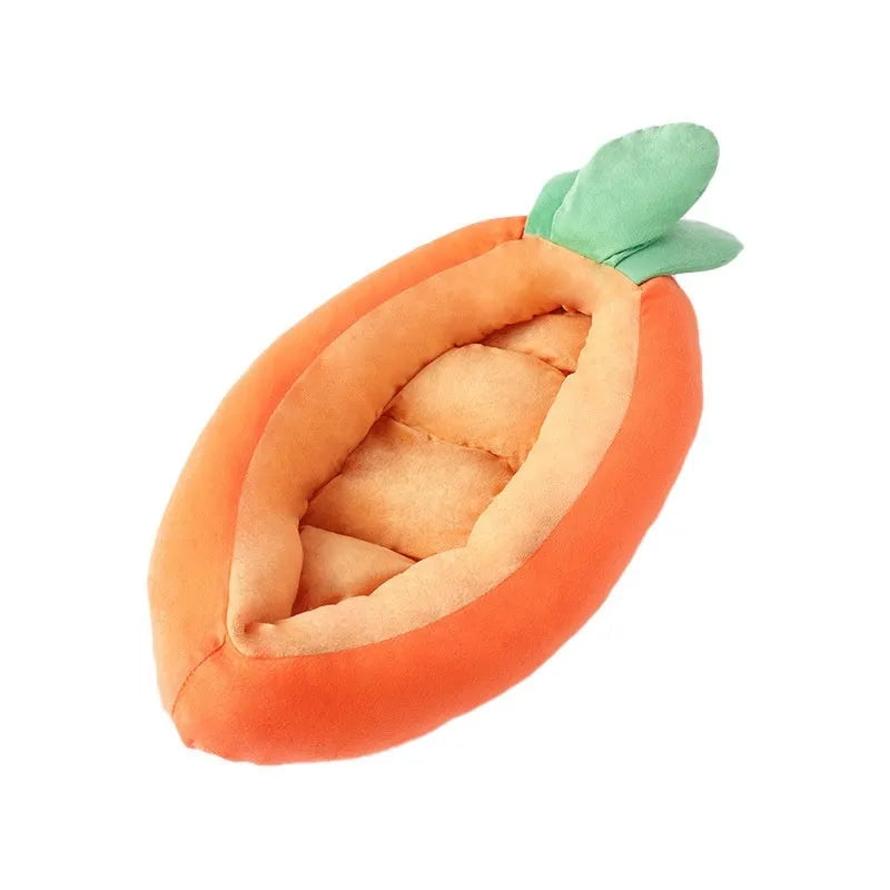 Carrot-shaped orange dog bed with removable washable cover on a floor