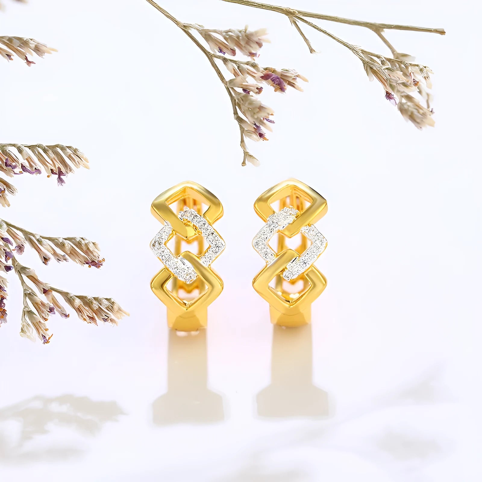 Geometric gold alloy earrings with hollow-out design and clip-on fittings