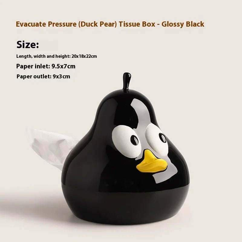 White ceramic pear-shaped tissue box in green or black colour on desktop