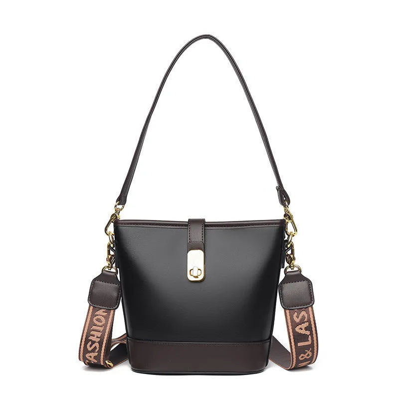Korean style soft PU bucket messenger bag with adjustable straps in black showing internal zipper compartments