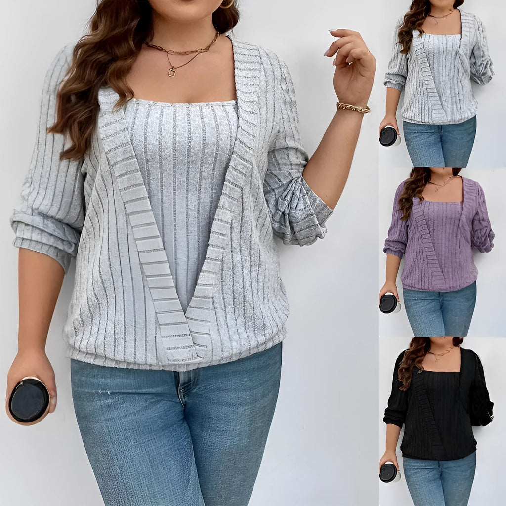 Woman wearing a solid colour rib fabric V-neck false two-piece suit with long sleeves in a loose fit.
