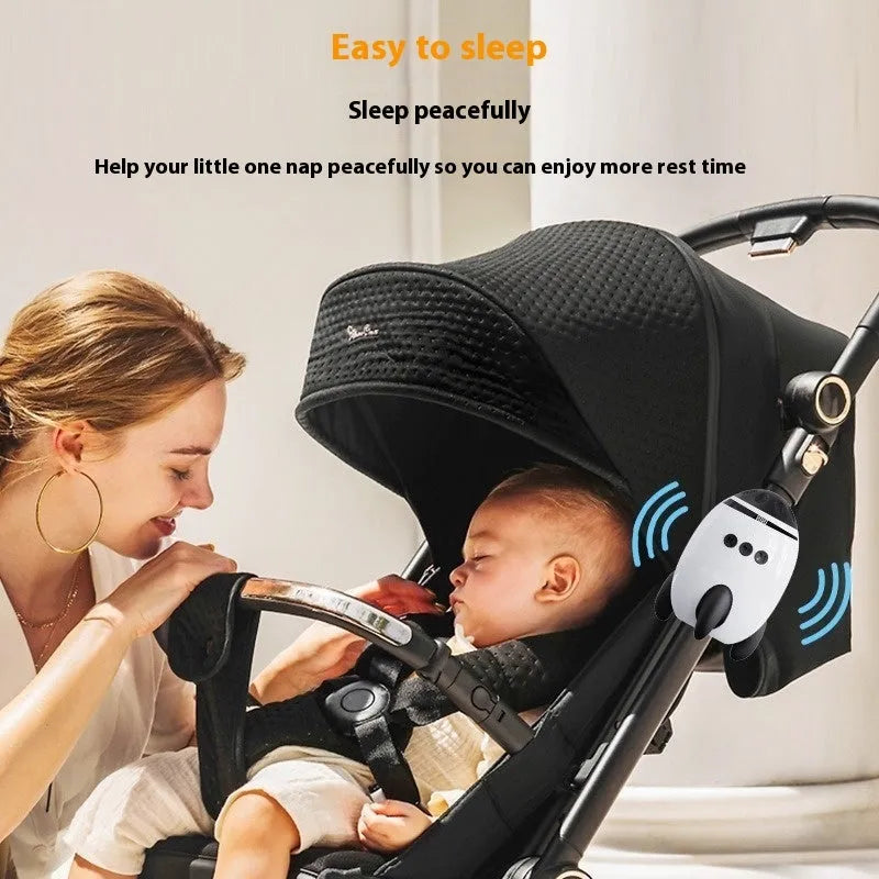 White portable baby sleep comforter shaking device with Bluetooth for white noise.