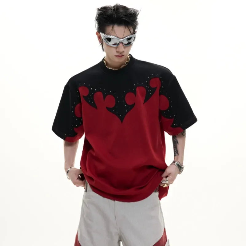 Men's red cotton t-shirt with burnt flower embroidery and rhinestone detailing on the front.
