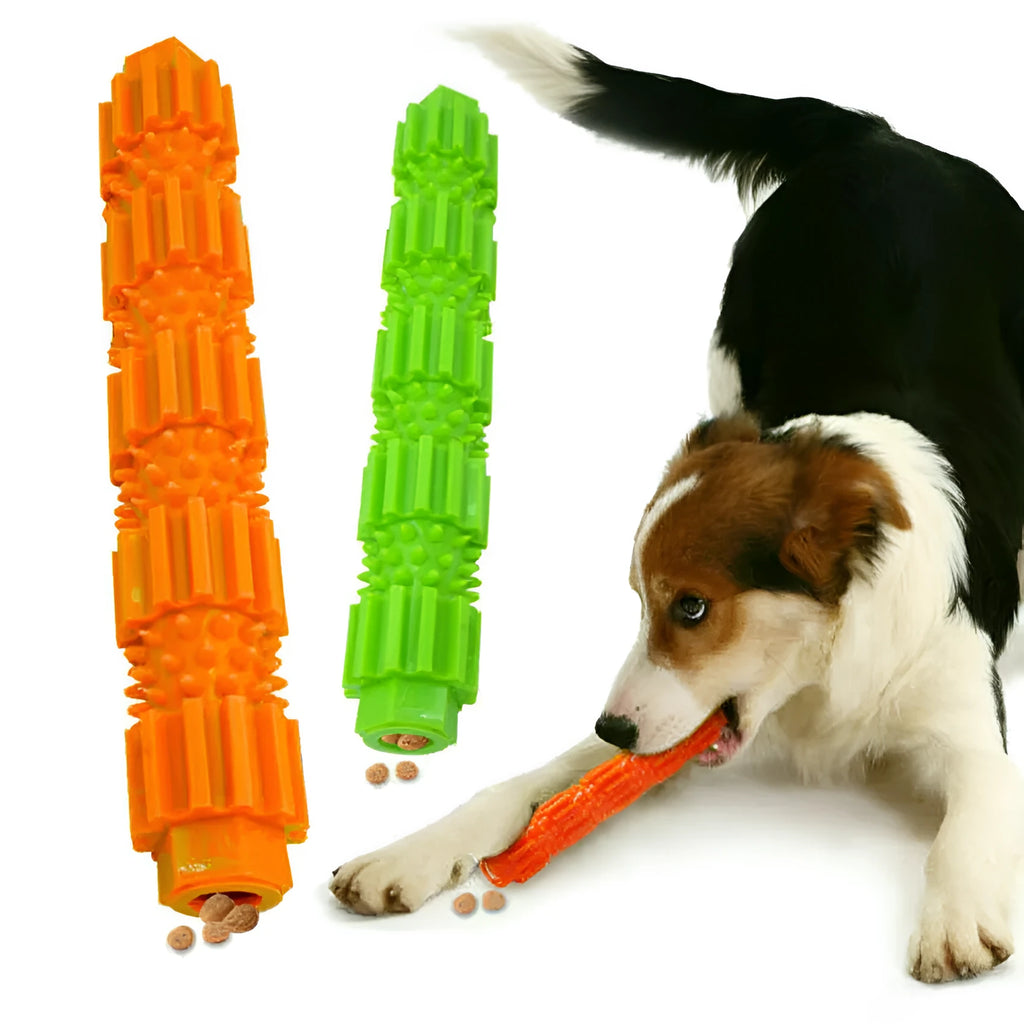 Green and orange rubber dog chew toy with hollow centre for treat dispensing