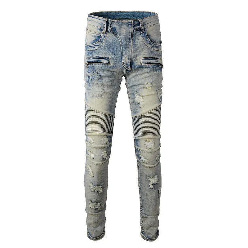 Men's light blue slim fit distressed jeans with hand-frayed details and a straight leg cut.