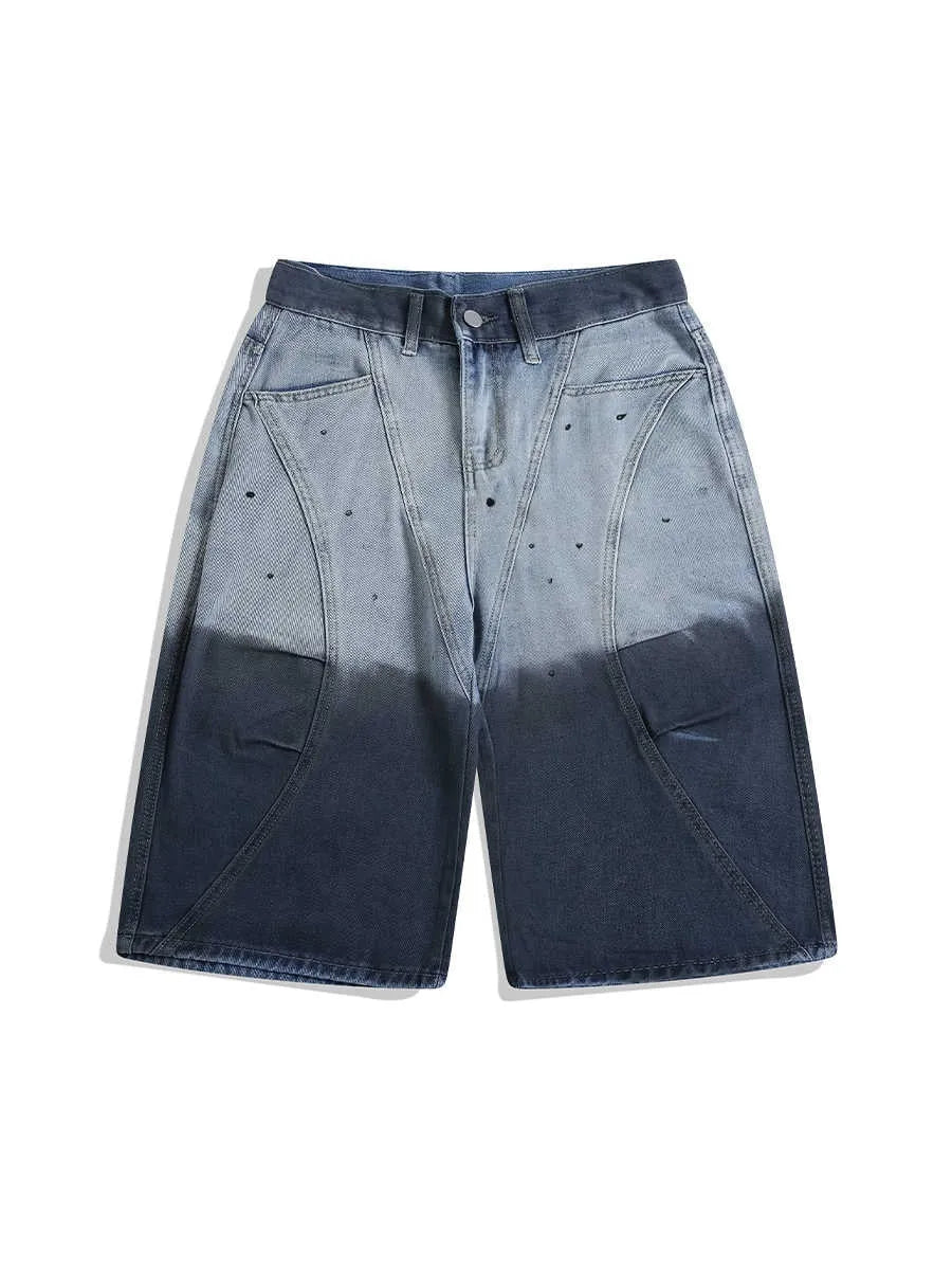 Blue tie-dye gradient cropped jeans with a worn-looking finish and loose, relaxed fit.
