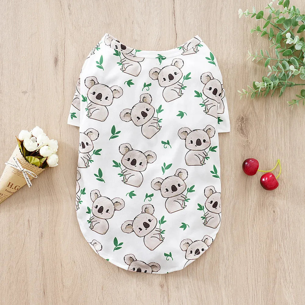 Full-print polyester t-shirt for a small dog, shown in one of six colour variants, with size chart for S, M, L, XL, XXL.