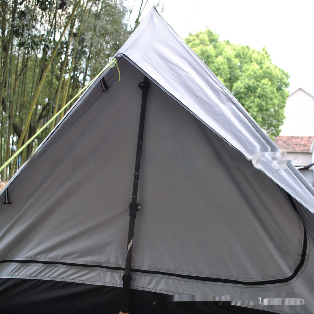 Brown or white A-line cabin tent using hiking canes for support with dimensions 210x150x110cm