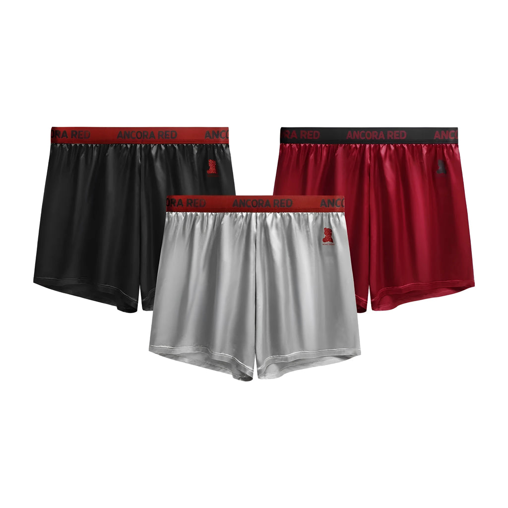 Solid colour men's boxer briefs in polyester knit fabric showing mid waist design