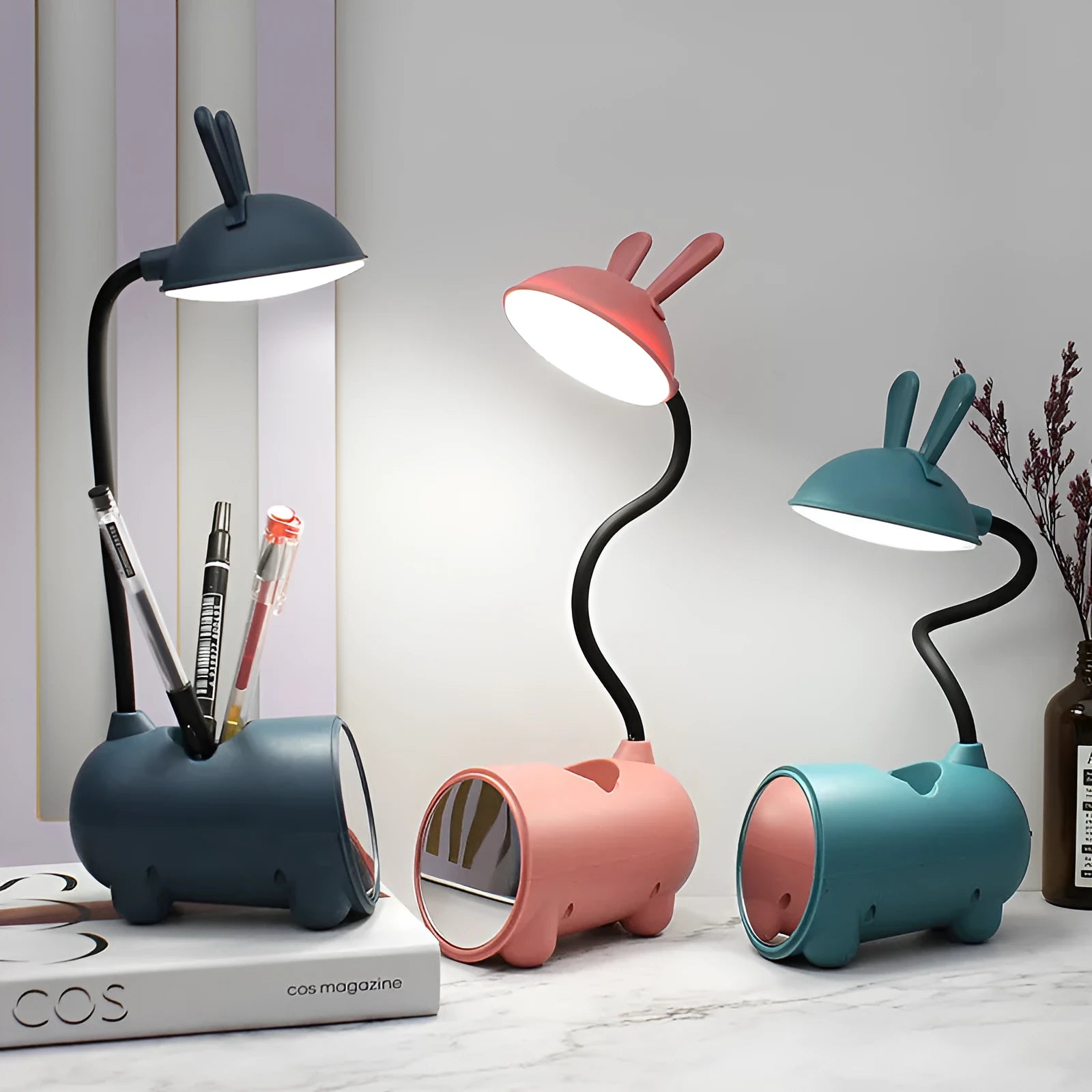 Cartoon-style plastic desk lamp with built-in pen container in dark blue colour