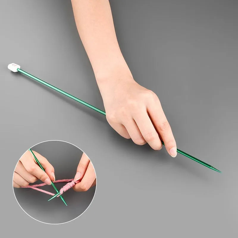 Set of crochet hooks in various sizes from 2.0mm to 10.0mm, each with a protective cap on a lengthened handle.