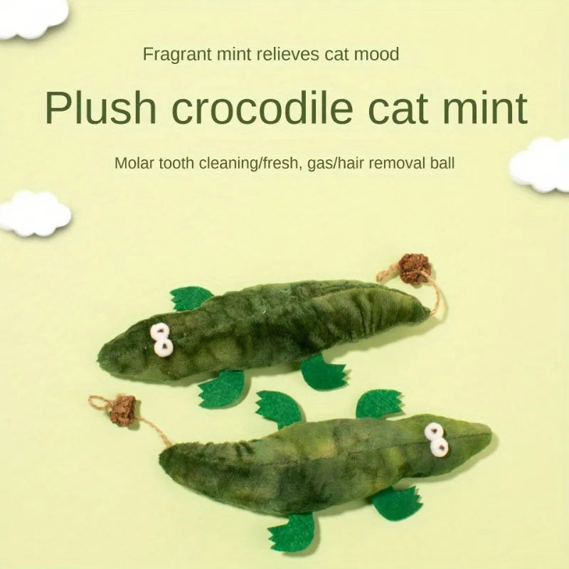 Green plush alligator cat toy with catnip filling and peppermint scent for oral cleansing