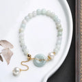 Natural jade peace buckle pearl bracelet for women with round pendant on pearl string