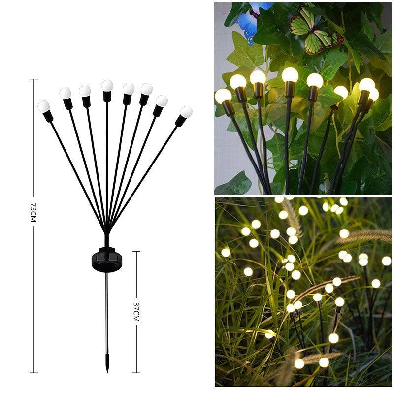 Solar-powered LED ground spike garden light with multiple heads and stainless steel soil plug.