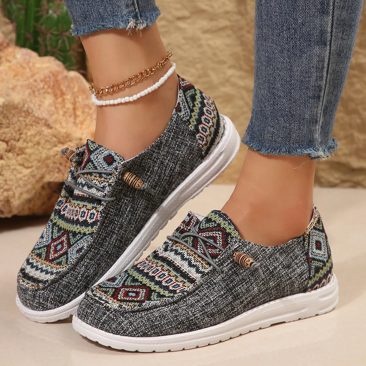 Women's flat round toe low-top shoes in black, dark grey, and khaki colours