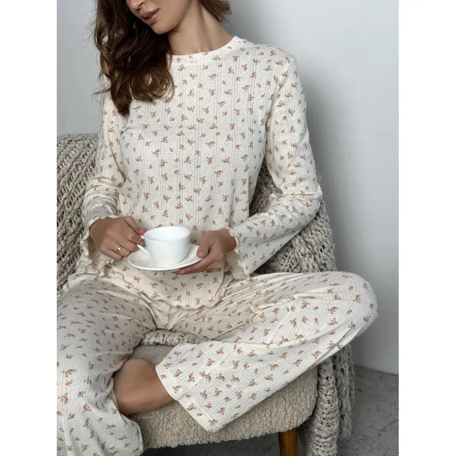 Women's white floral print lounge suit with bell sleeve top and wide leg trousers