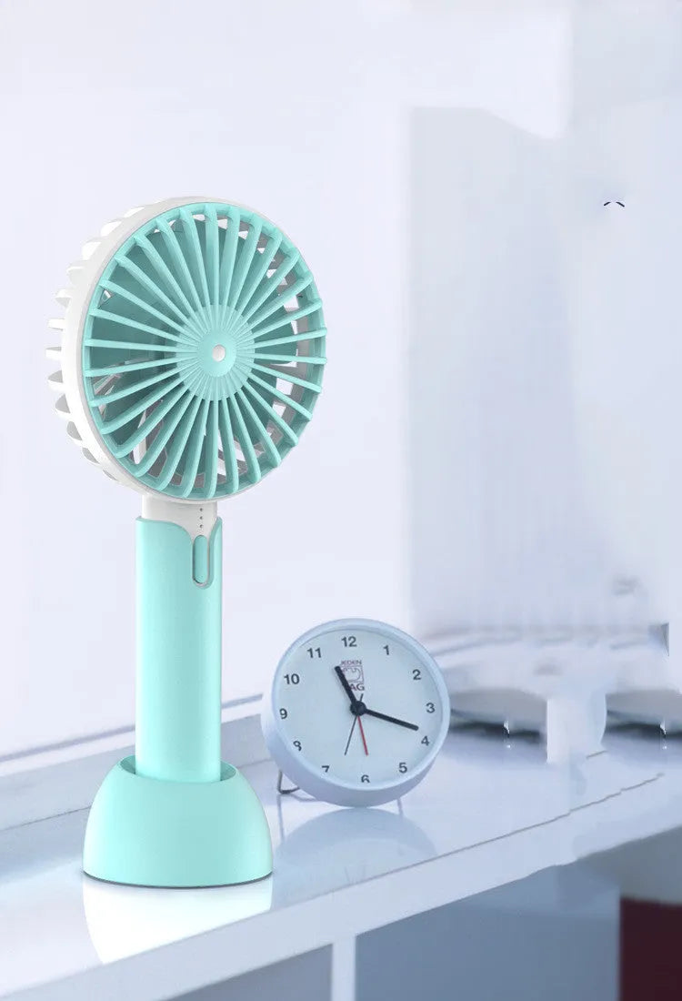 Blue handheld mini desktop electric fan with USB cable and three speed settings