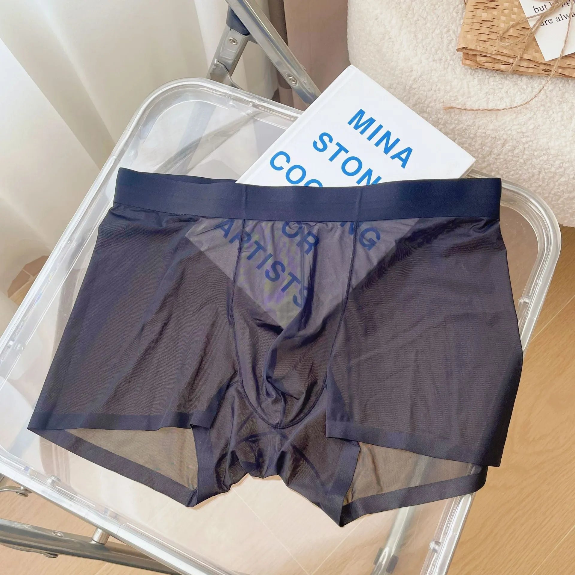 Men's thin knit nylon boxer shorts in rock ash colour showing seamless construction and mid-waist design