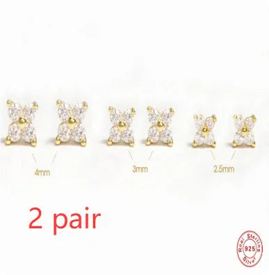 S925 sterling silver stud earrings with small crystal flower petals in gold and platinum finishes.