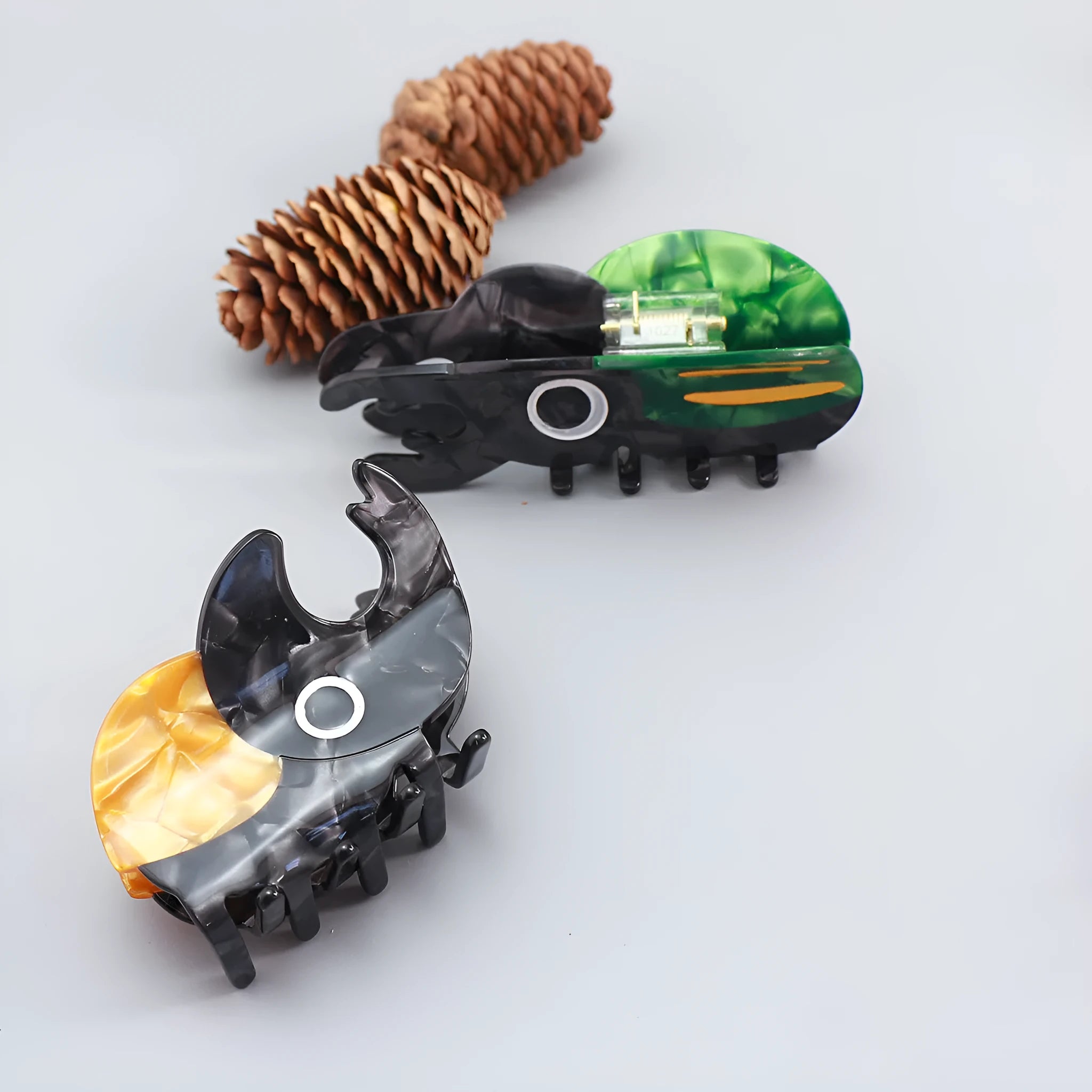 Handmade cellulose acetate insect biology beetle grip with cartoon beetle and caterpillar designs