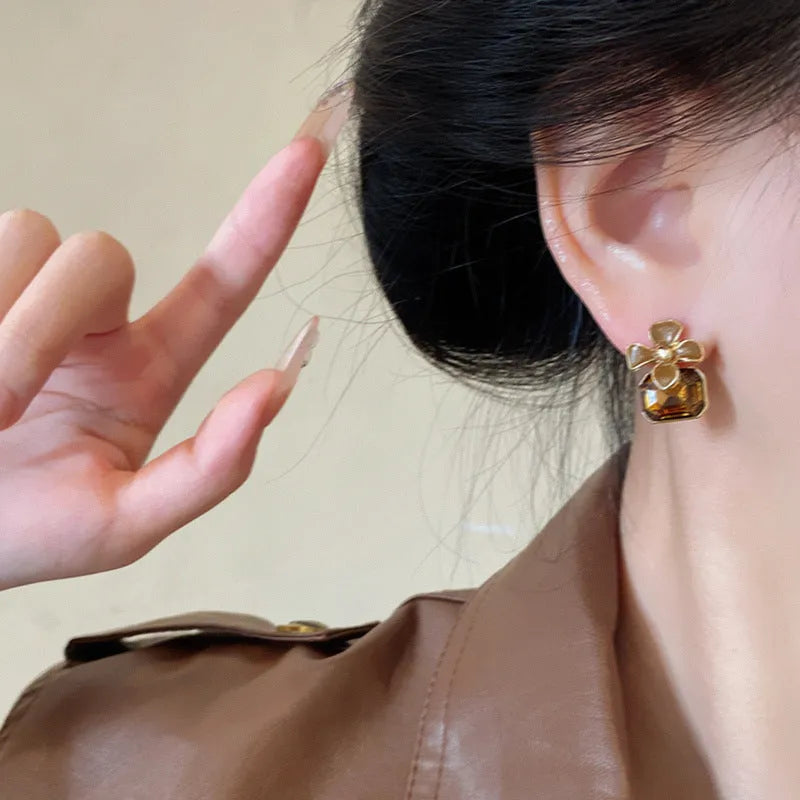 Gold electroplated alloy flower earrings with coffee colour floral motif for women