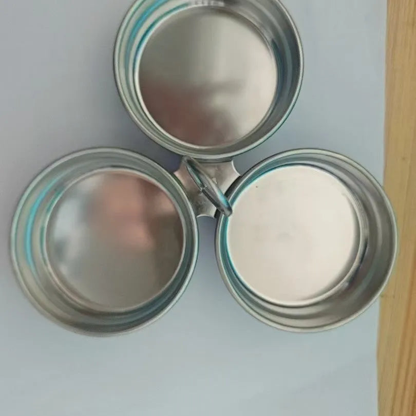 Heart-shaped stainless steel mini egg steamer for cooking individual eggs on stovetop