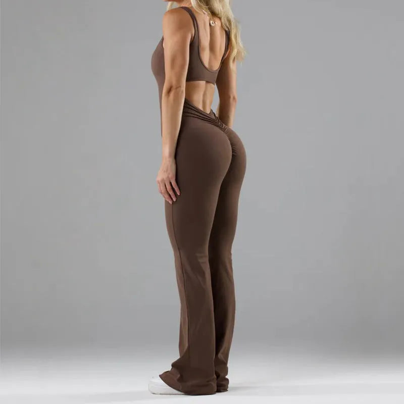 Women's black milk silk yoga bodysuit with seamless design and mid waist.
