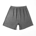 Men's solid colour modal boxer shorts with high waistband, shown in black, blue, gray, and brown.