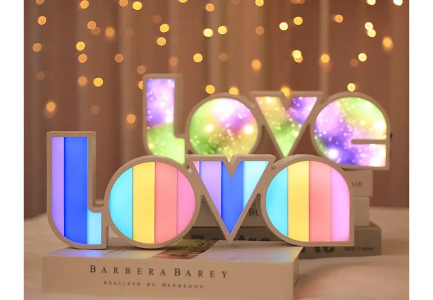 Rainbow coloured LED decorative light spelling LOVE, with USB cable.