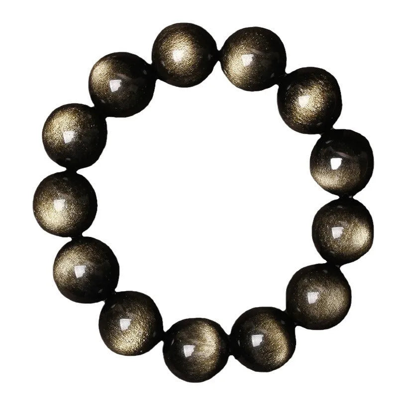 Hand-woven obsidian bracelet with round beads and engraved birth year detail for couples