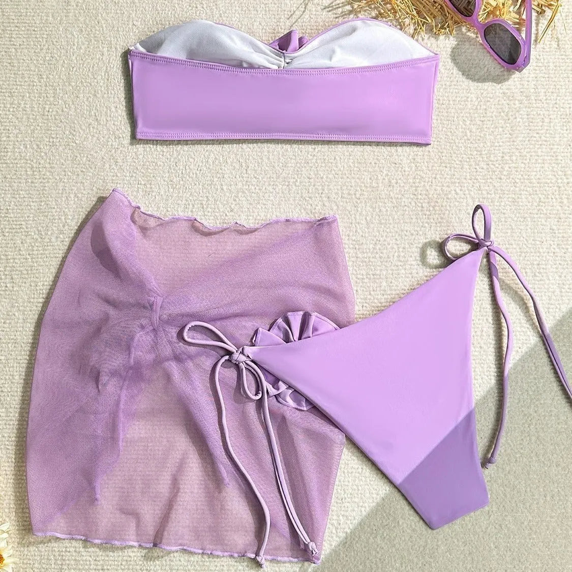 Women's pink swimsuit tube top with three-dimensional flower tie design and matching skirt