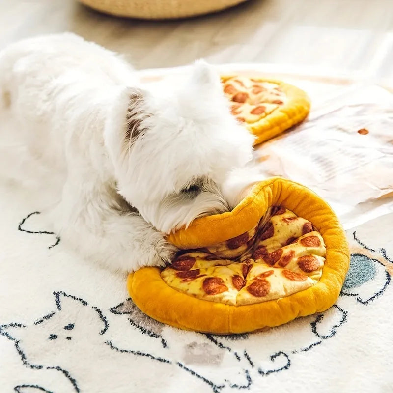 Yellow pizza slice shaped squeaky dog chewing toy with textured toppings and crust detailing