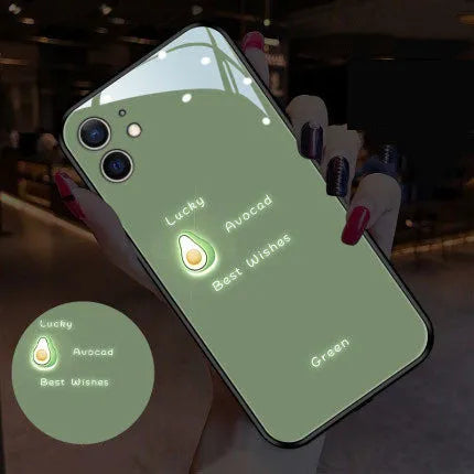 White luminous phone case with painted daisy design for Apple iPhone, showing voice-activated light feature.