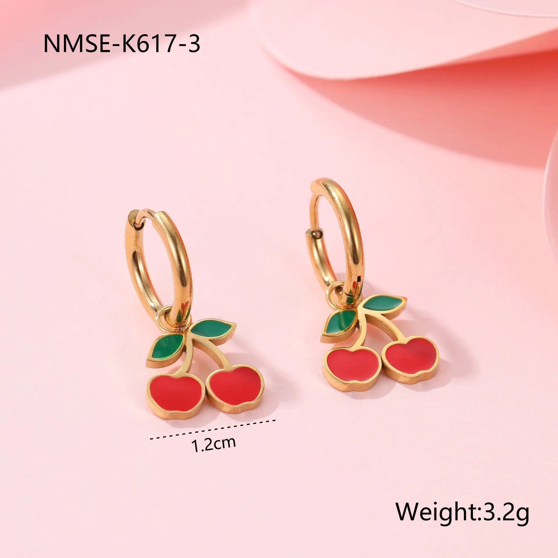 Cherry-themed jewellery set showing stainless steel necklace, bracelet, earrings, and ring with 18K gold plating.