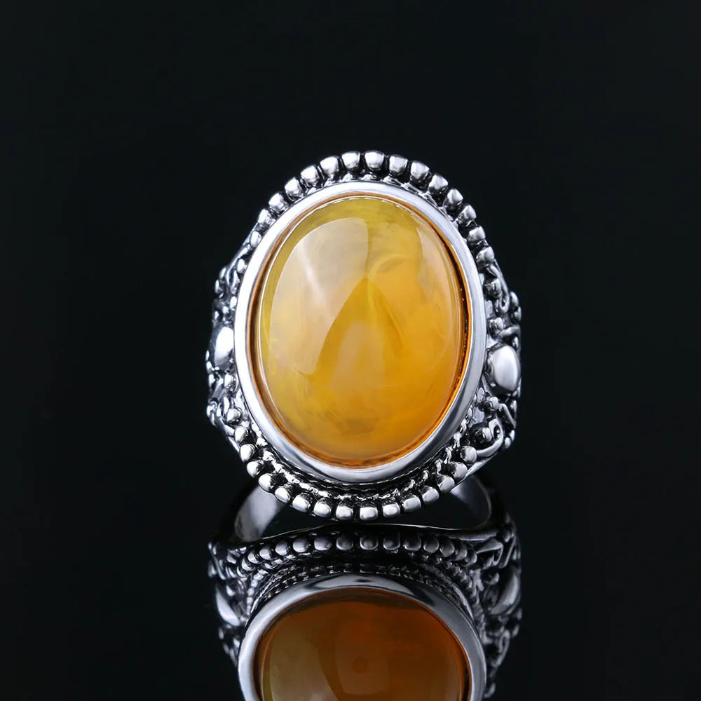 Retro geometric alloy ring with fluorescent beeswax electroplating in antique silver amber colour