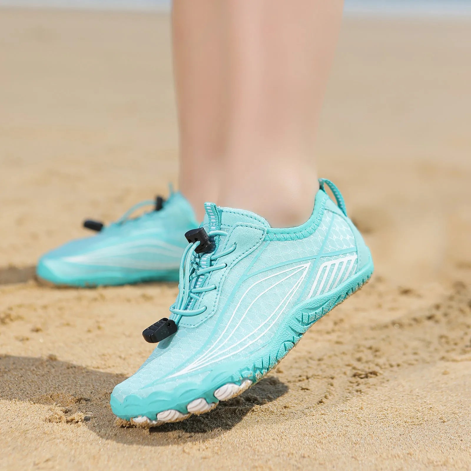 Children's quick-drying wading shoe with non-slip rubber sole and elastic band, shown in blue.