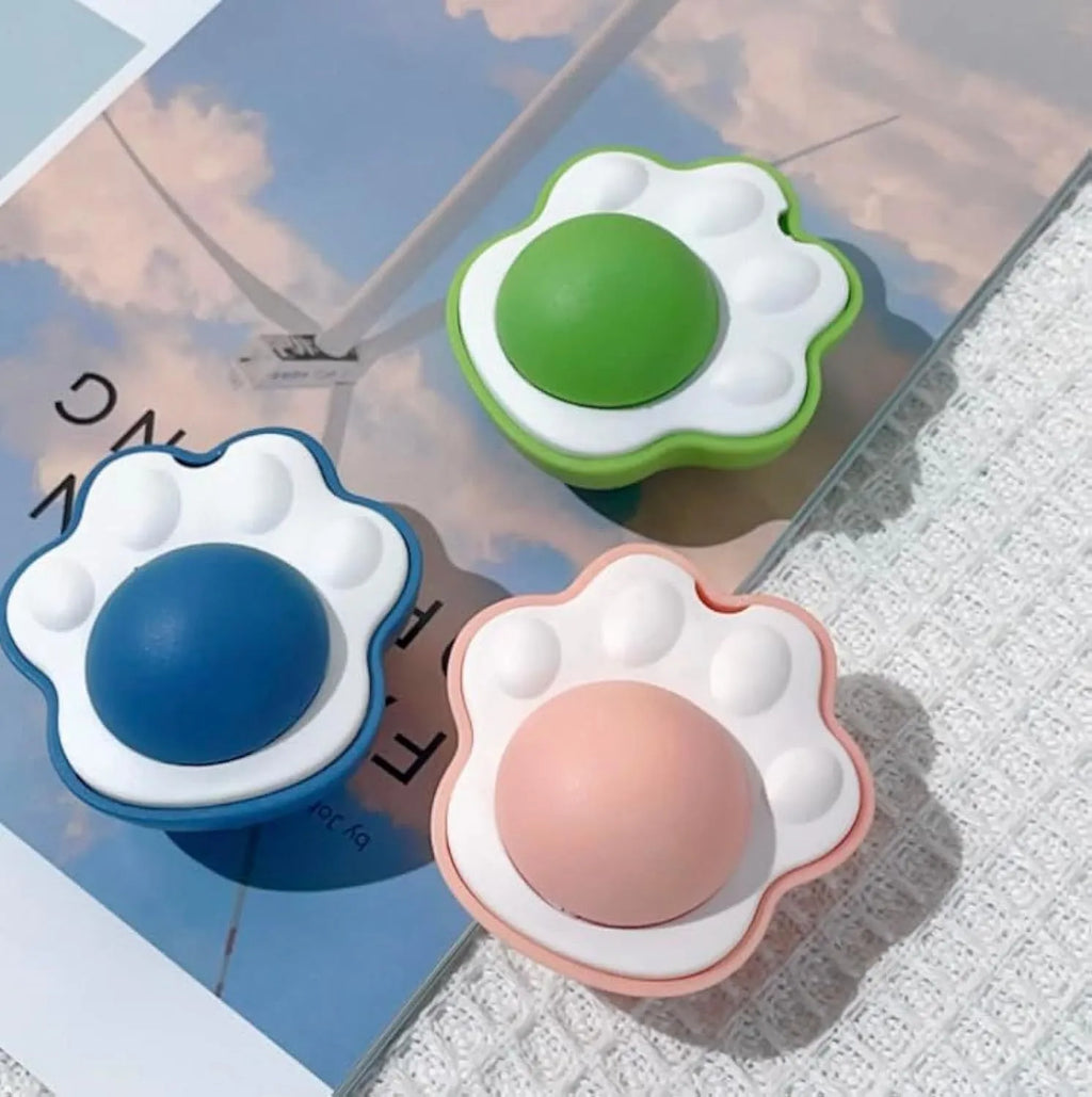 Coloured catnip balls with textured edible vine surface for feline dental cleaning and interactive play