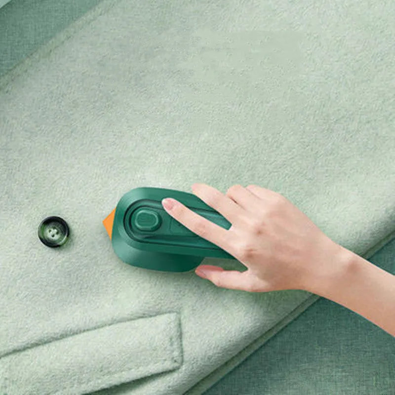 Dark green portable hanging ironing machine with ceramic panel and worldwide voltage adjustment