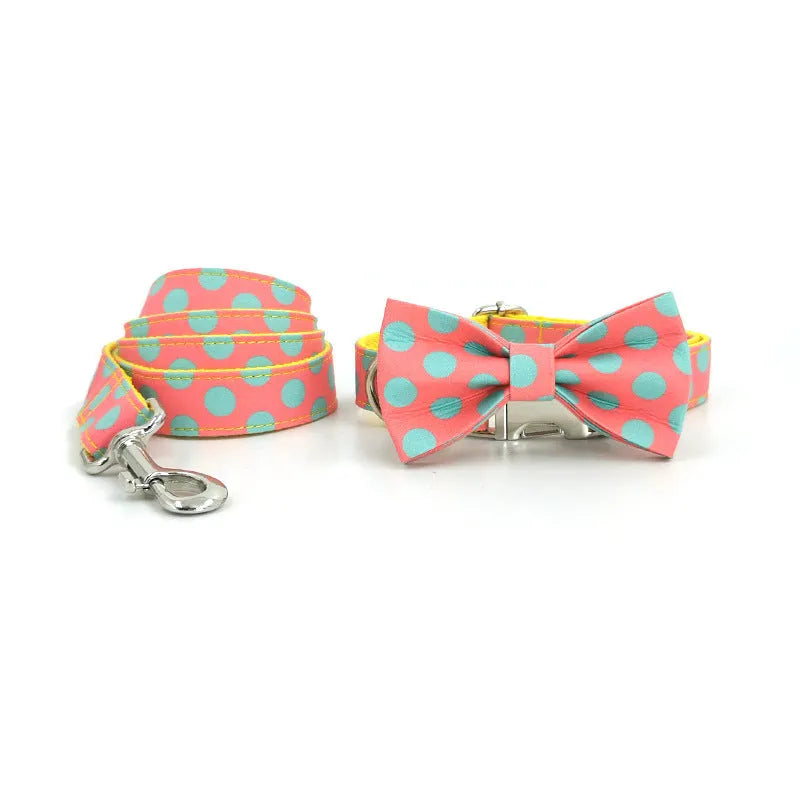 Yellow polka dot dog lead and collar set made of polyester with hand-holding rope design