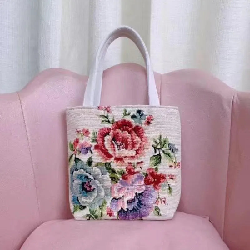 Double-sided gold wire embroidered canvas tote bag in small, medium, and large sizes with floral patterns.