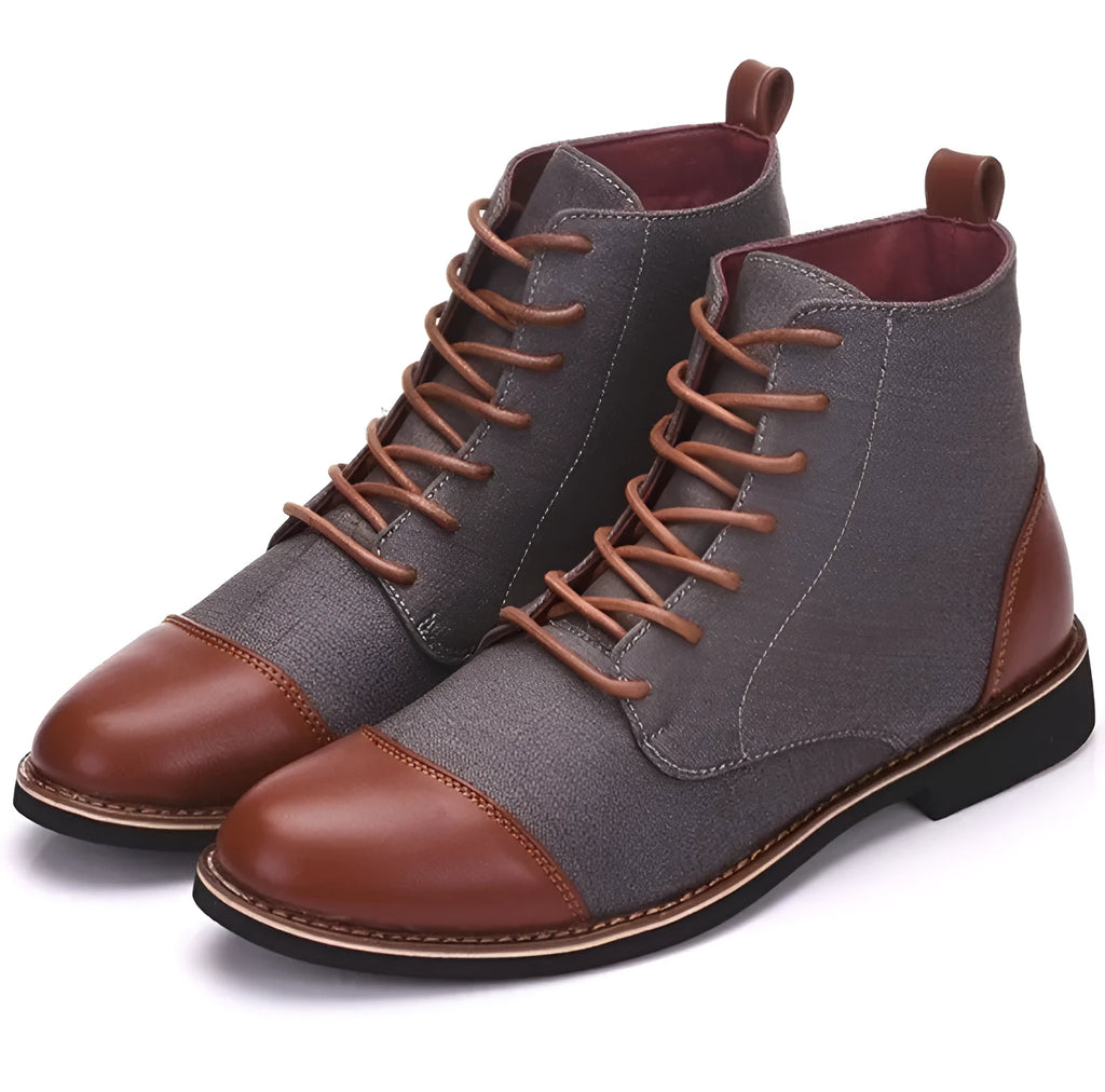 Men's black leather motorcycle-style boots with silver belt buckles on the side, featuring a thick rubber sole.