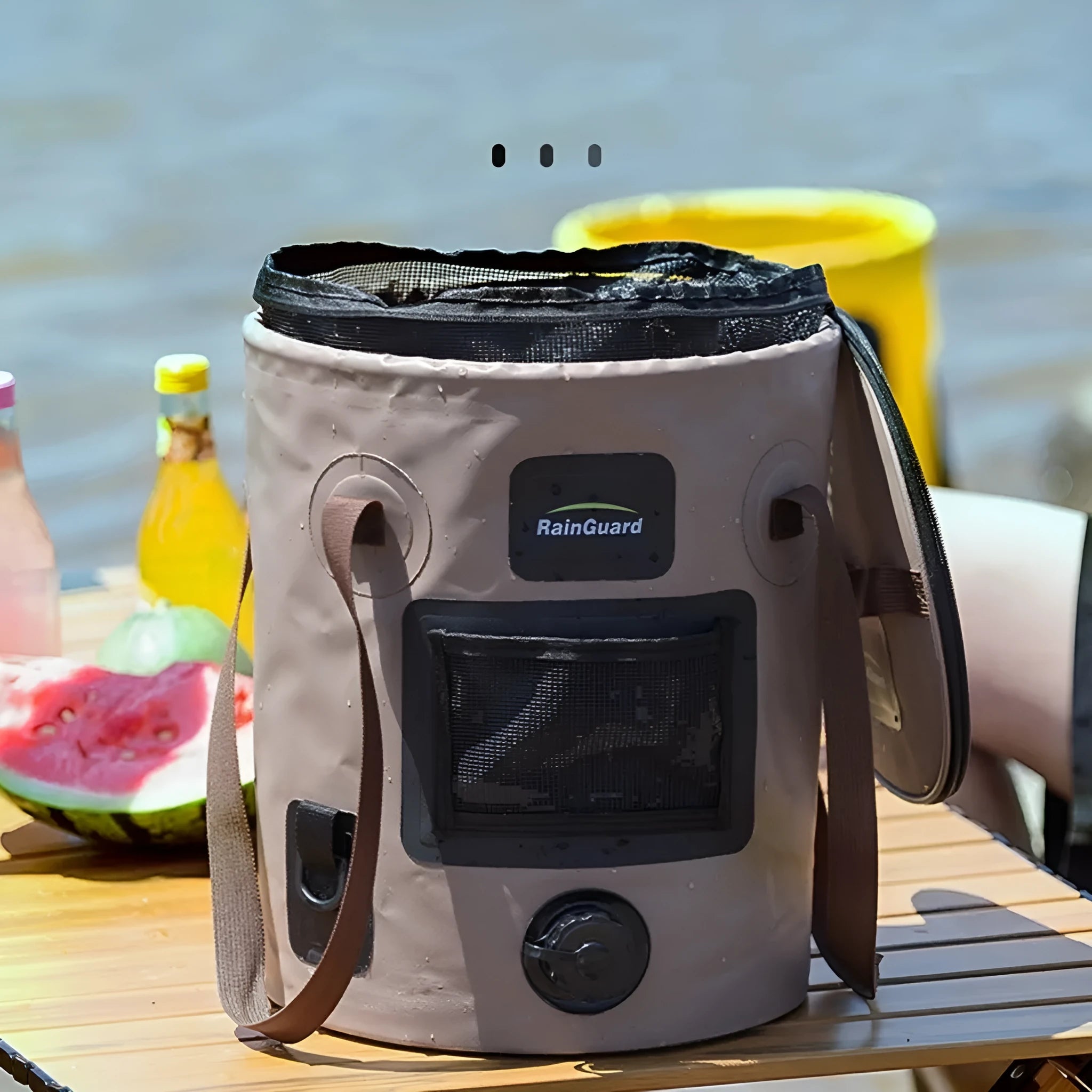 Outdoor portable folding fishing bucket in lemon yellow colour showing 25L capacity and foldable design