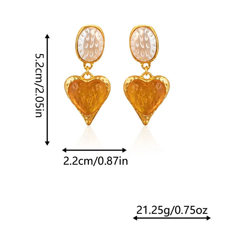 Oval-shaped love heart stud earrings with a pleated silver texture in purple, red, green, and yellow/white colours.