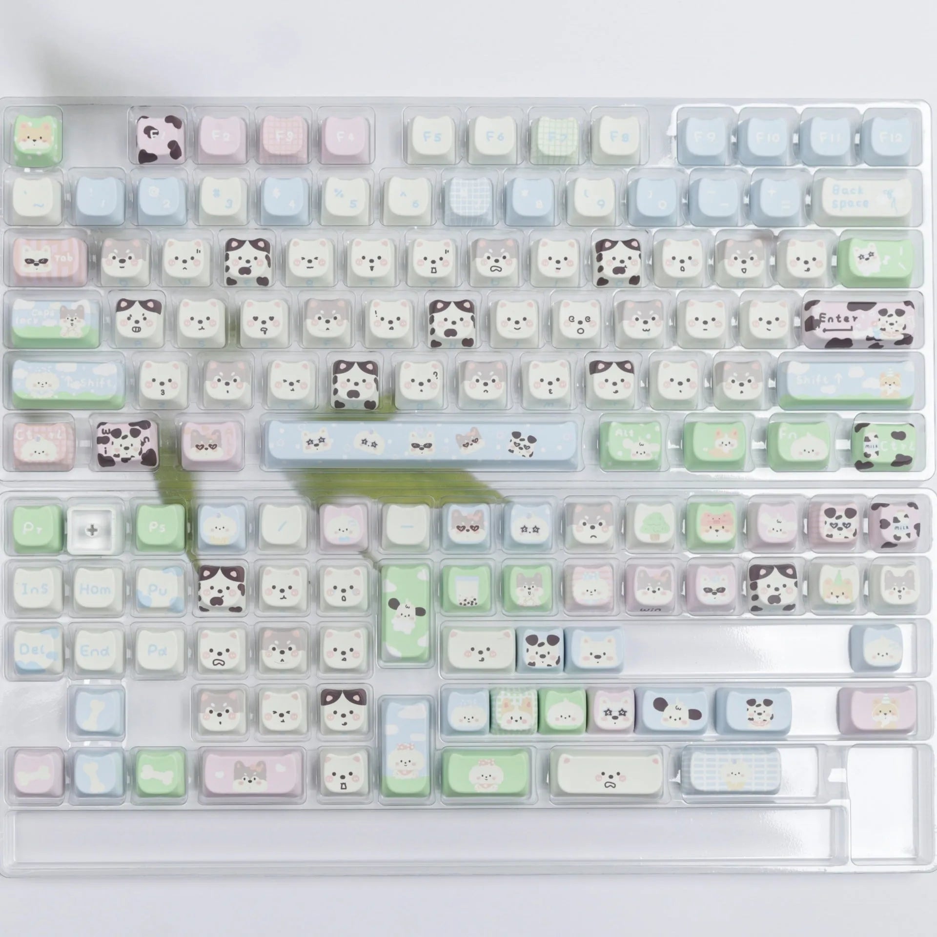 Colourful cat and puppy themed PBT key cap set for mechanical keyboards with cartoon animal artwork