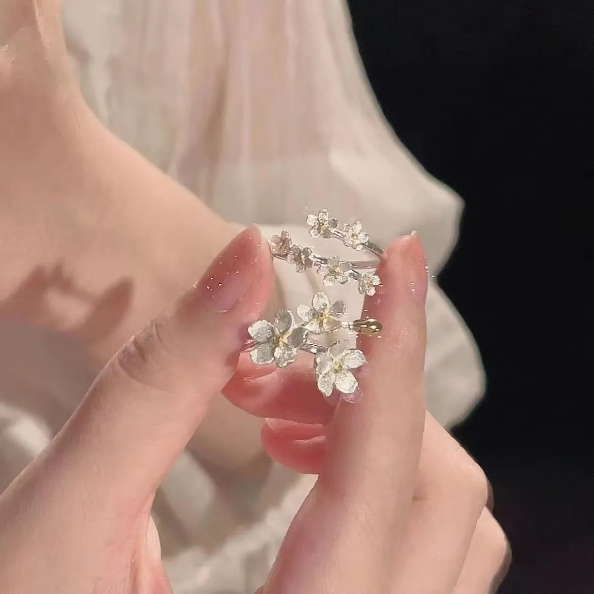 Three-dimensional jasmine flower ring with adjustable open-mouth design and electroplated finish