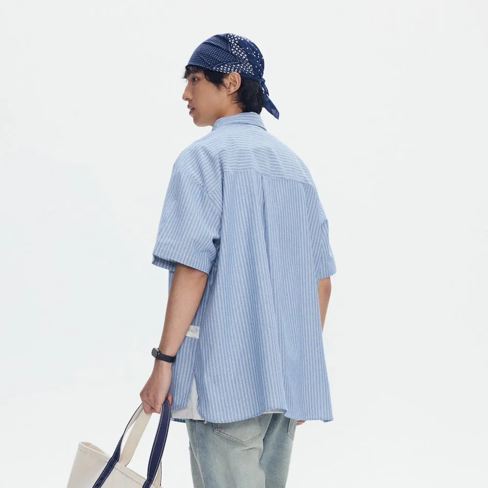 Blue striped short-sleeved cardigan-style shirt with loose fit and cotton blend fabric