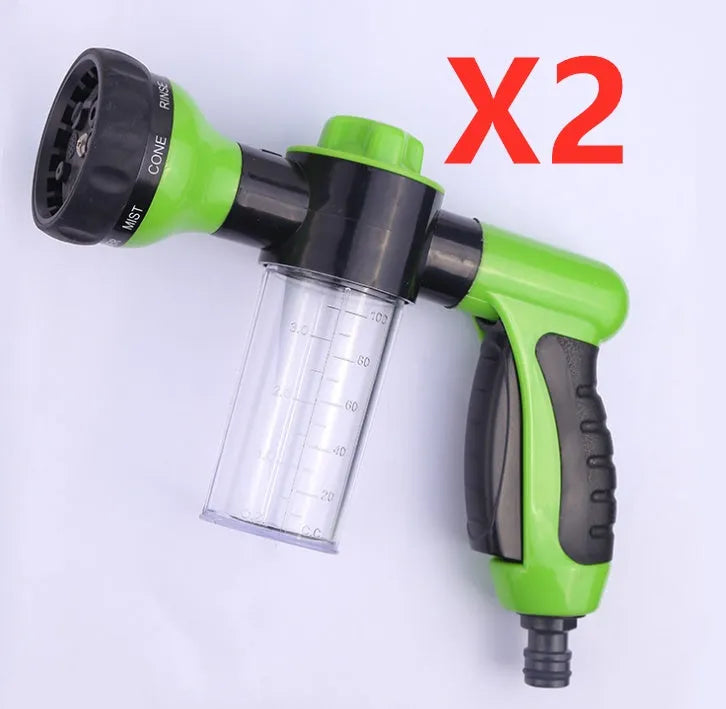 Green high pressure foam spray gun with adjustable nozzle for car washing and household cleaning.