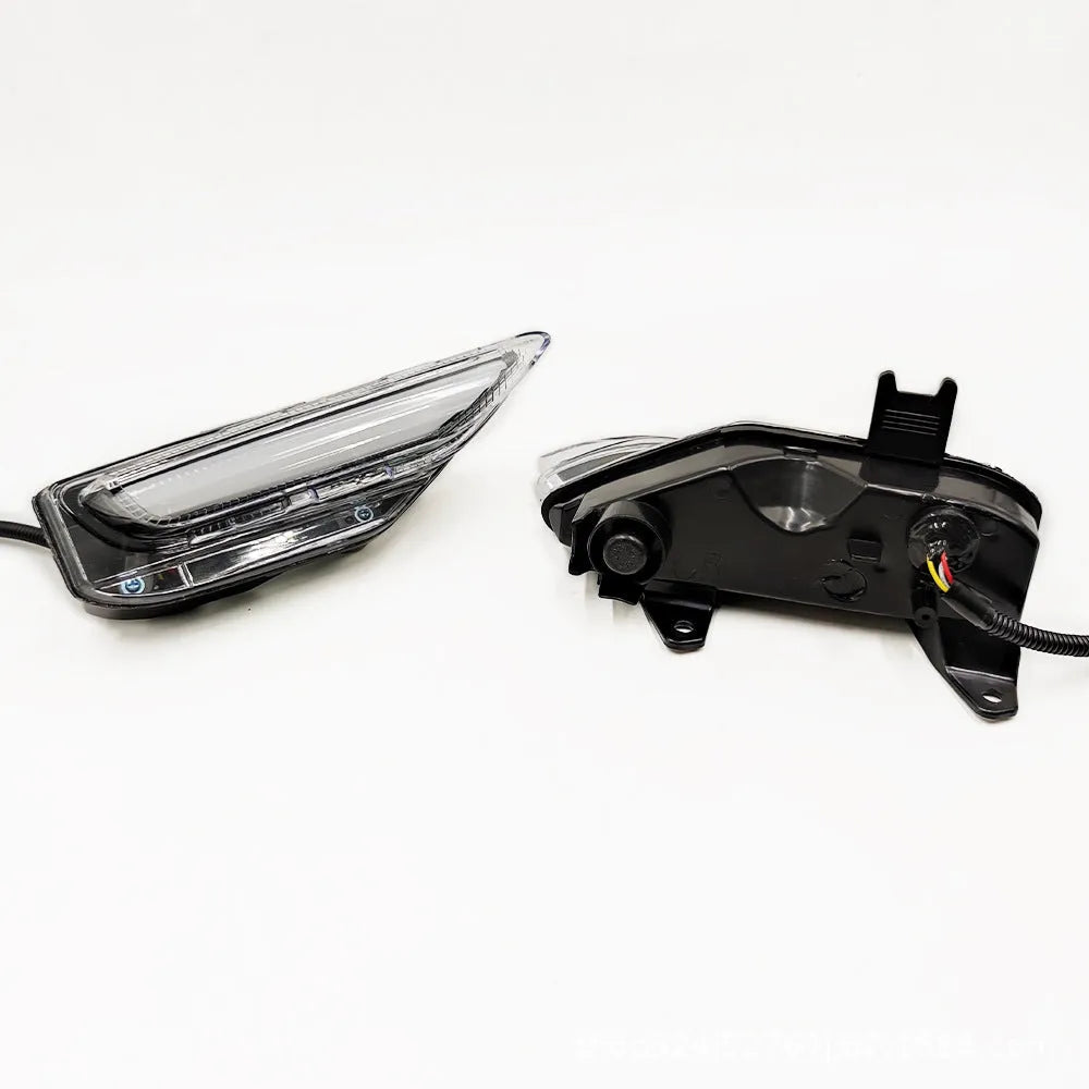 Infiniti Q50 Q70 front bumper LED daytime running light and turn signal unit with ABS housing.
